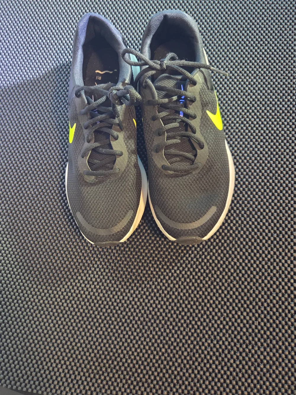 Nike Men's Black Running Shoes with Neon Yellow Swoosh